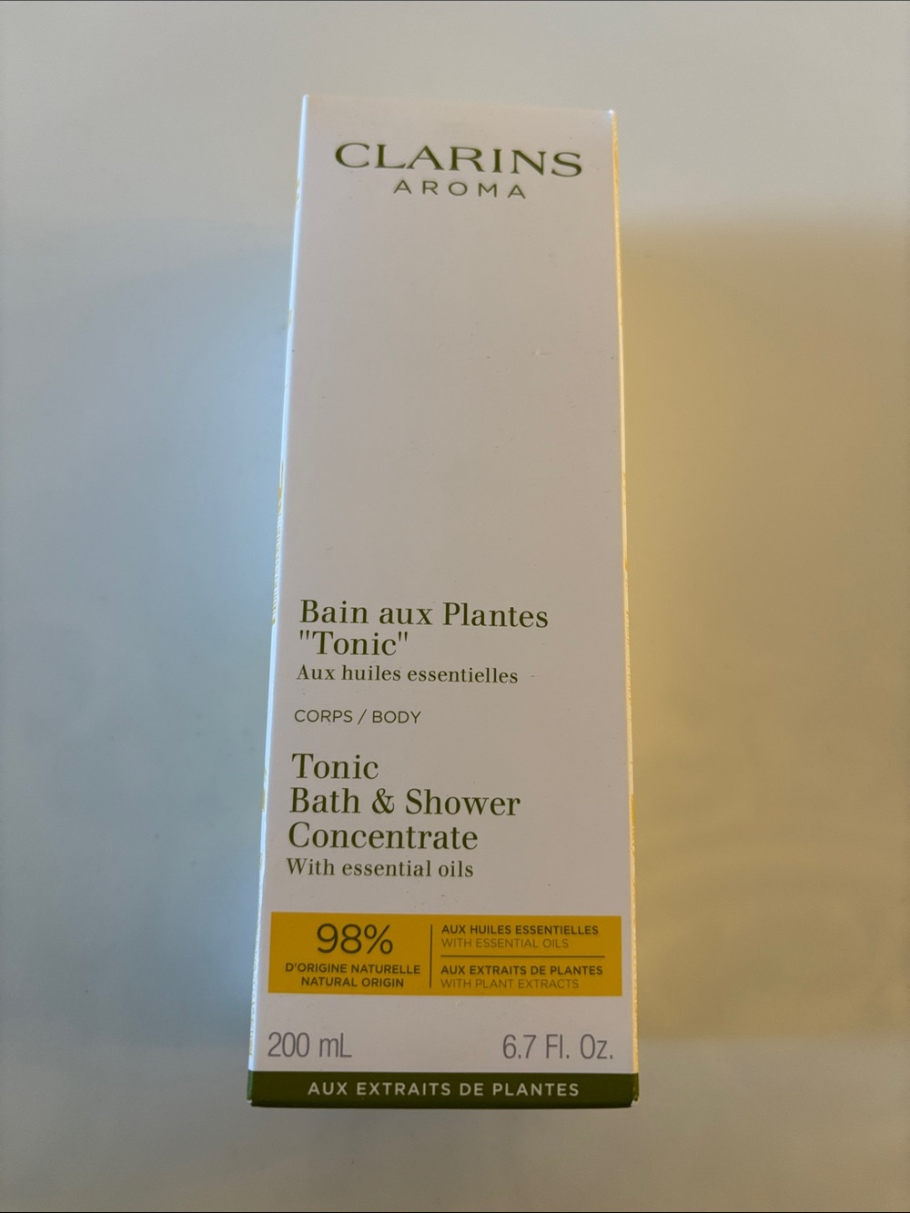 Clarins Tonic Bath & Shower Concentrate — White with Yellow Accents